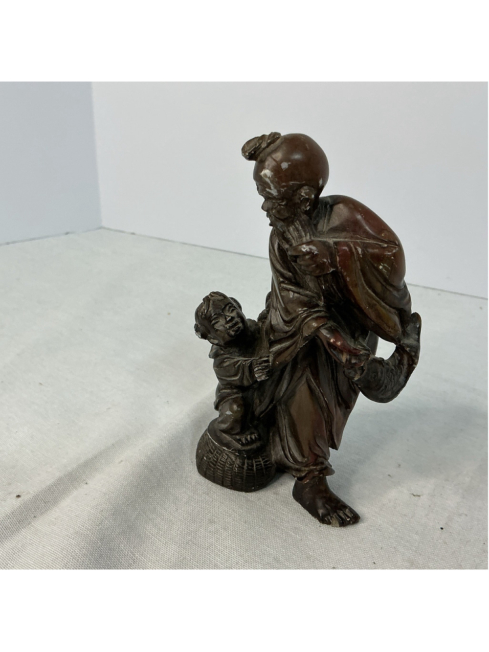 Carved Resin hard stone, Man With Child/Elder Immortal Dark Brown 5”tall